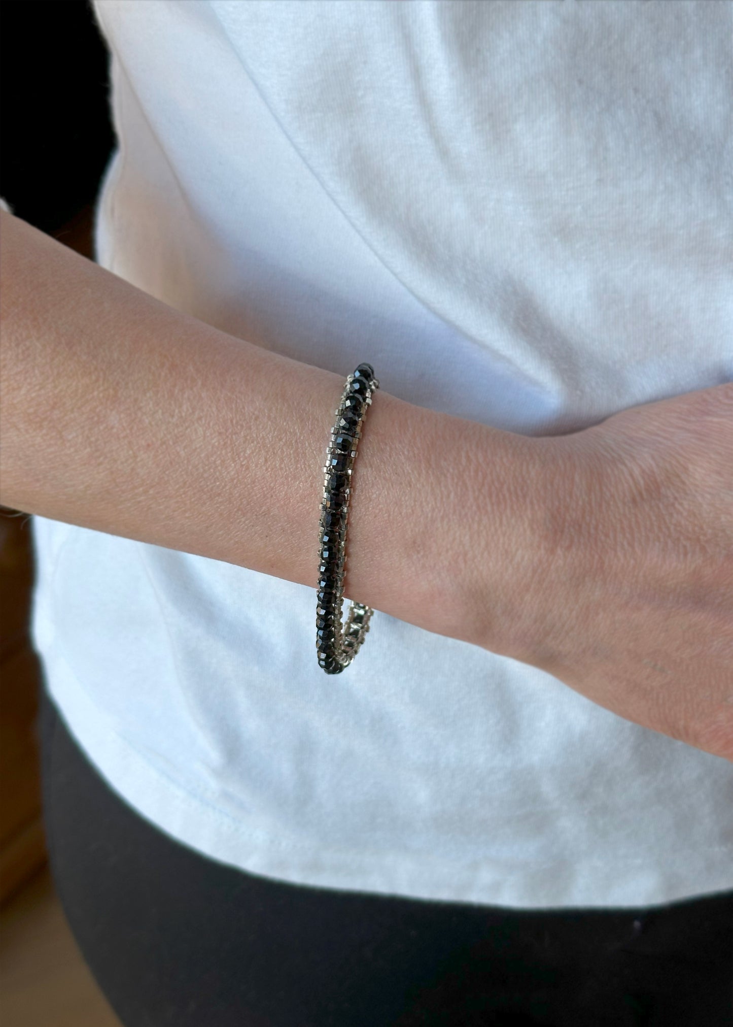 black spinel faceted gemstone tennis bracelet