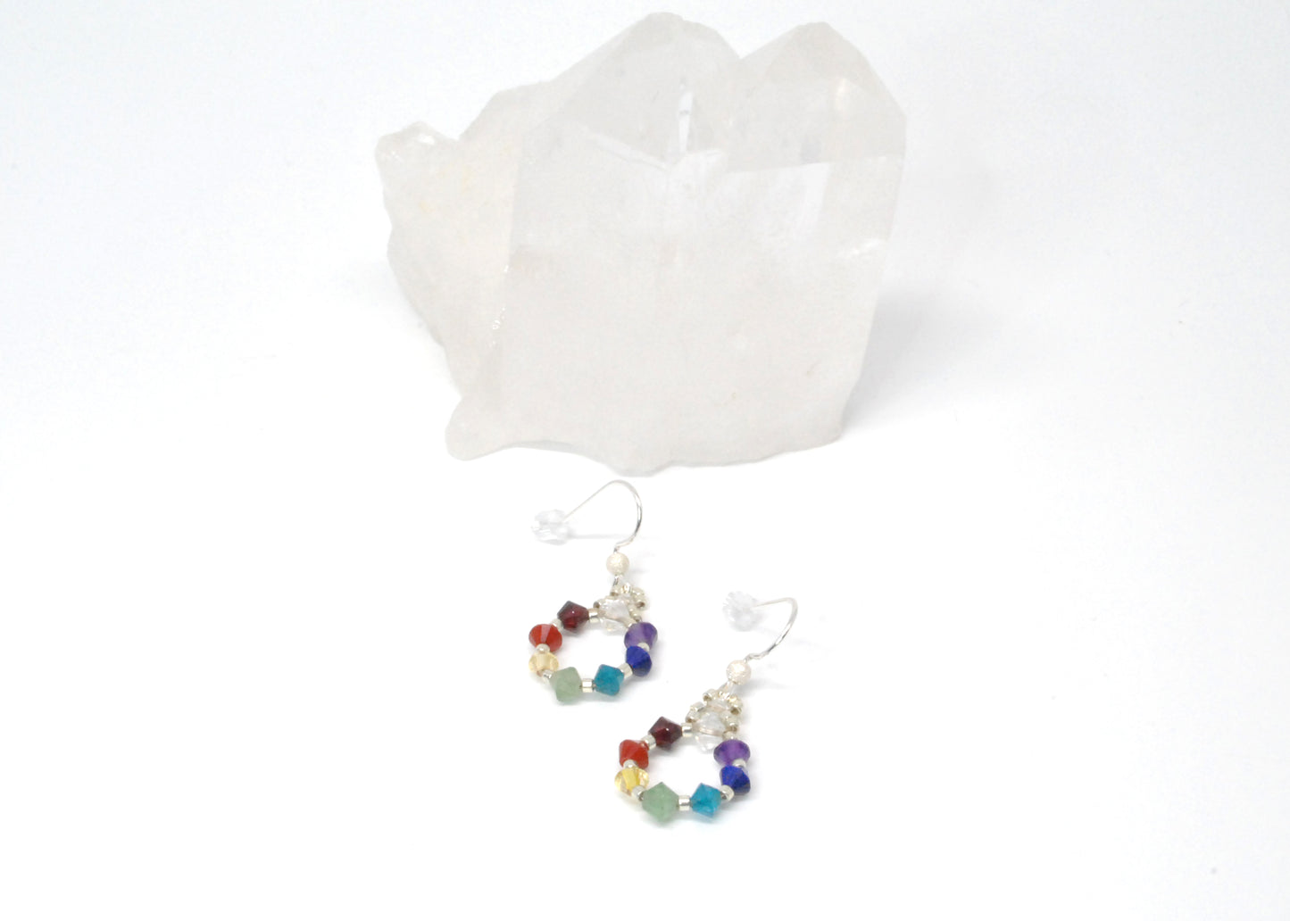 rainbow gemstone chakra earrings woven in a circle pattern. nickle free and lightweight due to the woven style. 