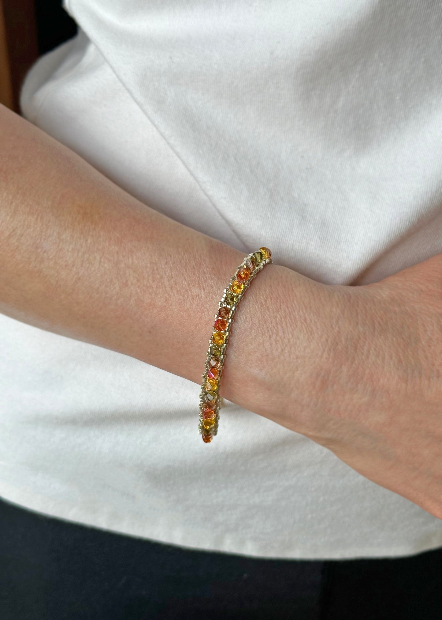 swarovski crystal tennis bracelet . fall colors