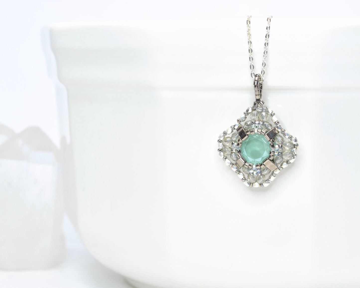 mint green and silver swarovski crystal cushion cut pendant . #034