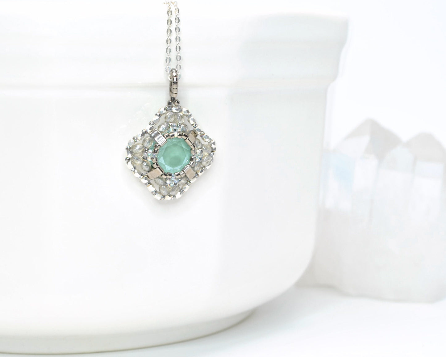 mint green and silver swarovski crystal cushion cut pendant . #034