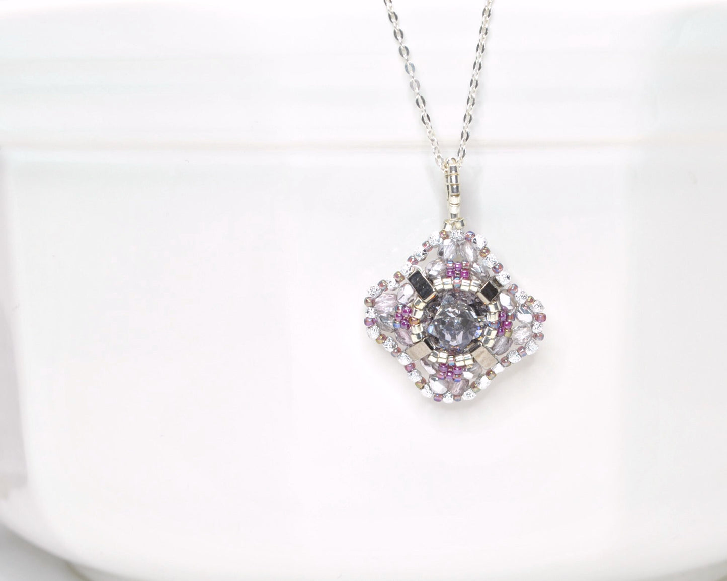 silver and mauve purple swarovski cushion cut crystal pendant . #002