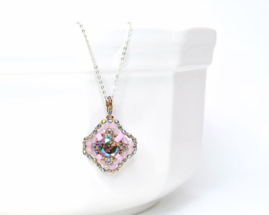 pink and iridescent green-gray swarovski crystal cushion cut pendant necklace . #013