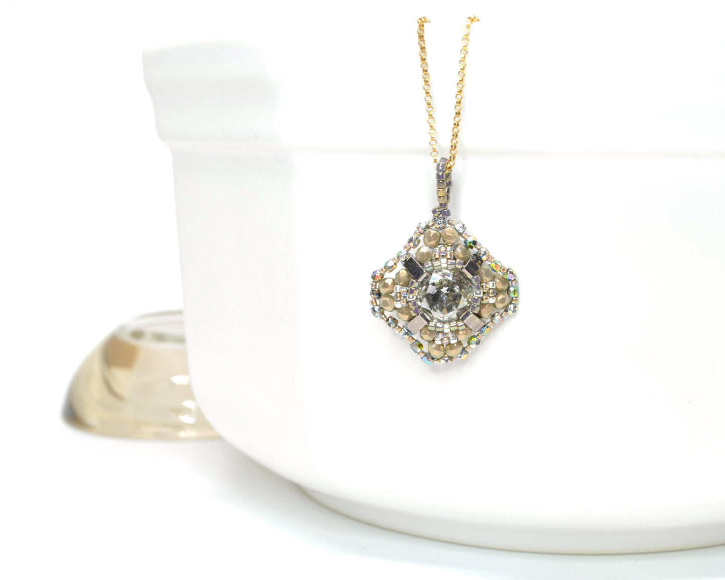 gold beaded swarovski crystal cushion cut pendant . #033