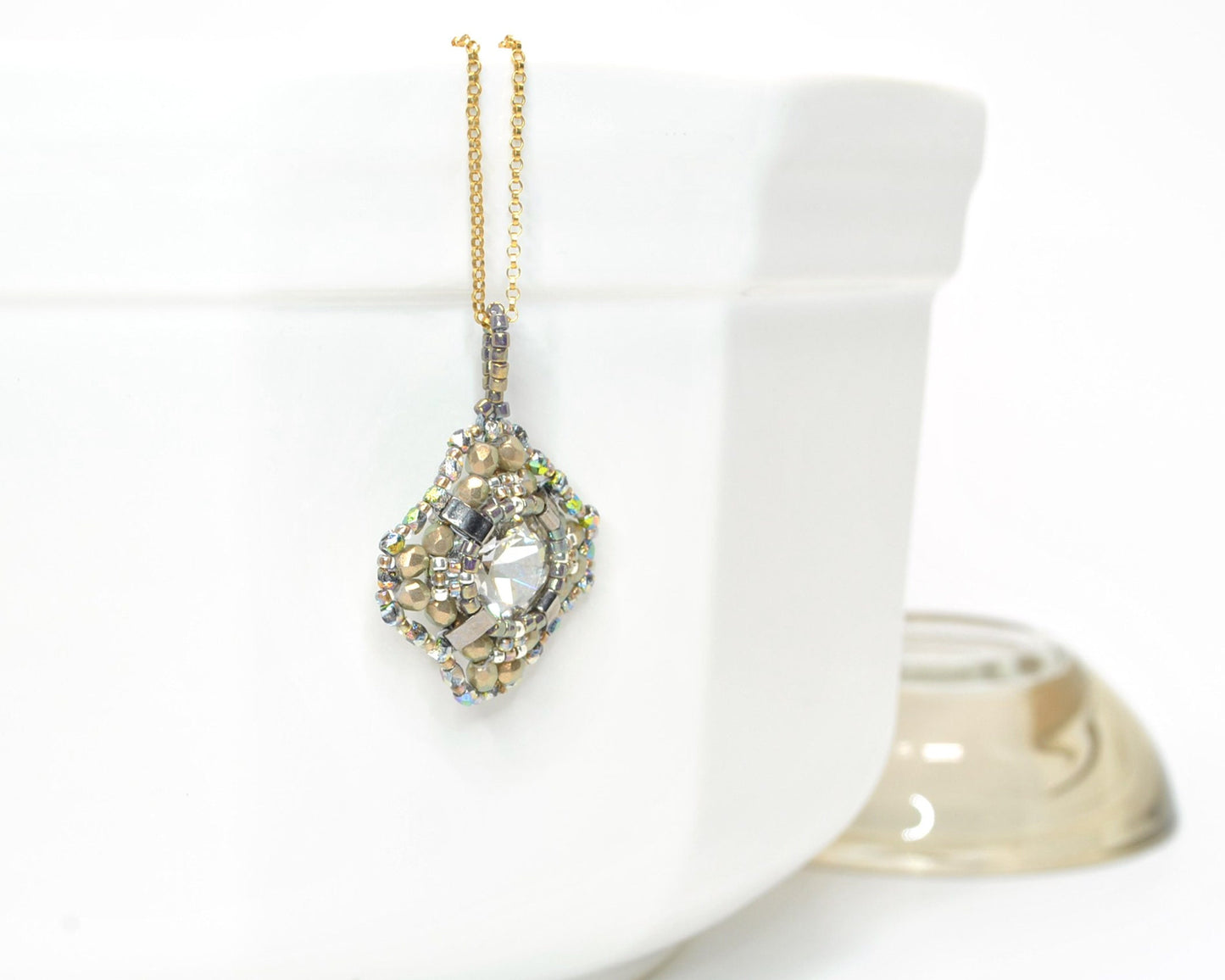 gold beaded swarovski crystal cushion cut pendant . #033