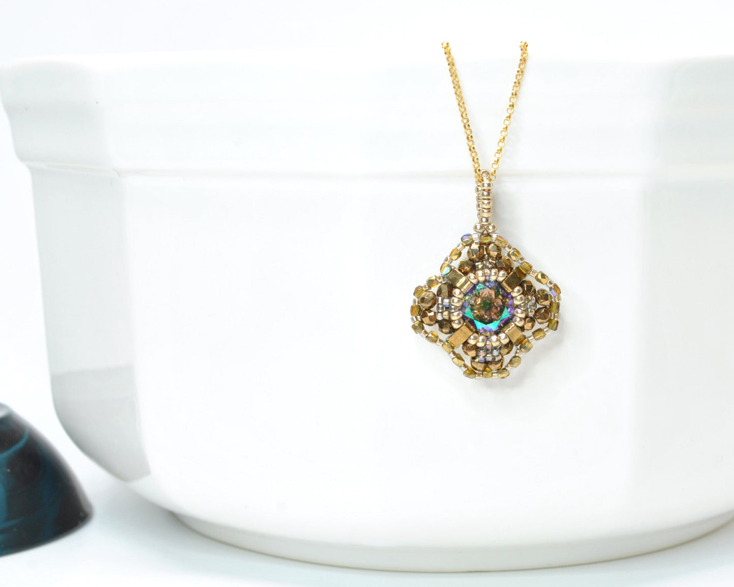 gold and iridescent swarovski crystal cushion cut pendant necklace . #014